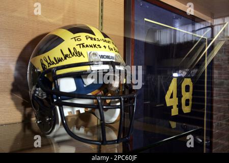 bo shembecler autographed football helmet for sale **FILE** An autographed football helmet by Bo Schembechler to former  President Gerald Ford is displayed next to Ford's football jersey at the  University of Michigan in Ann Arbor in this March 11, 2006 file photo. Ford  who declared 