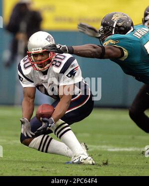 New England Patriots receiver Troy Brown stretches prior to game against  the Denver Broncos during the AFC divisional playoff game at Invesco Field  in Denver on January 14, 2006. (UPI Photo/Gary C.