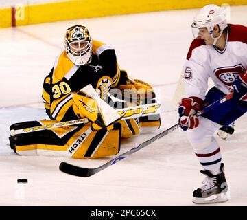 Montreal Canadiens' Sergei Samsonov, center, slides into Boston