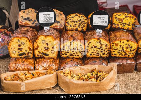 Assortment of different types of homemade rye cereals and sweet bread in a street food market Stock Photo