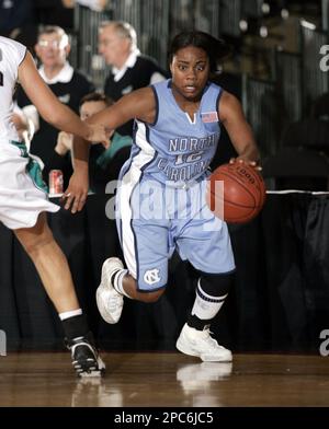 North Carolina guard Ivory Latta (12) drives to the basket as UC ...