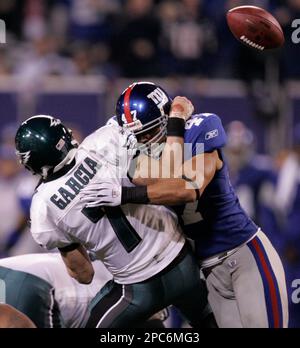 New Orleans Saints Reggie Bush breaks away from New York Giants Will Demps  in the 2nd quarter at Giants Stadium in East Rutherford, New Jersey on  December 24, 2006. The New York