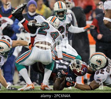 Miami Dolphins Renaldo Hill (24) applies pressure as Baltimore Ravens Mark  Clayton (89) is unable to catch a pass during the second half of their  Sunday, Jan. 4, 2009, NFL playoff football