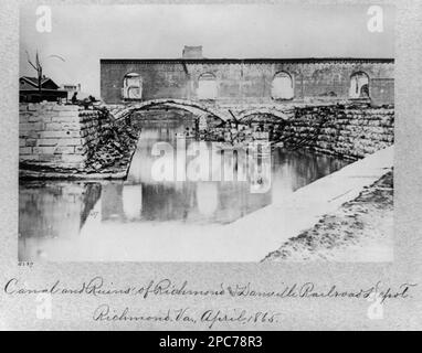 Canal and ruins of Richmond and Danville Railroad Depot, Richmond, Virginia, April, 1865. No. B237, Title from item, Gift; Col. Godwin Ordway; 1948. Canals, Virginia, Richmond, 1860-1870, Railroad stations, Virginia, Richmond, 1860-1870, United States, History, Civil War, 1861-1865, Destruction & pillage, United States, Virginia, Richmond. Stock Photo