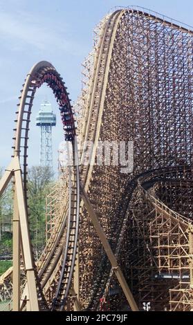 FILE Riders on the Son of Beast wooden roller coaster go