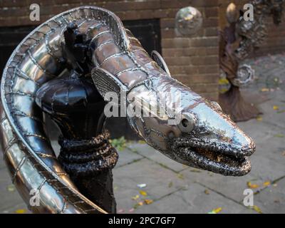 King Wrapped in the Coils of a Life-Sized Conger Eel Stock Photo