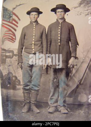 Two unidentified young soldiers in Union sack coats and Hardee hats ...