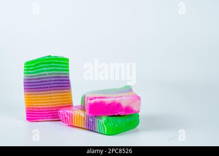 Kue Lapis Pelangi or Rainbow Sticky Layer Cake is Indonesian traditional dessert made from rice flour and coconut milk. Stock Photo