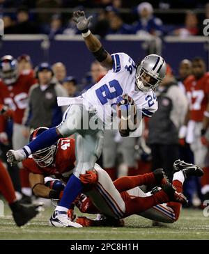 Dallas Cowboys running back Marion Barber (24) gets past the tackle of New  York Giants safety Will Demps (47) late in the second quarter at Giants  Stadium in East Rutherford, New Jersey