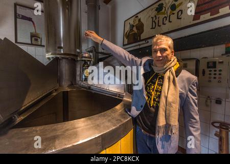 A real shrine. The bottle of Black Abbot blessed by Pope Francis after the brewery won a years-long legal battle. Brewery Klosterbrauerei Neuzelle, Germany Stock Photo