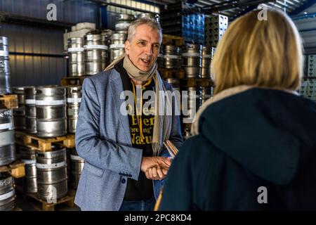 Stefan Fritsche, managing director of Klosterbrauerei Neuzelle, stirs