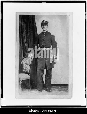 Unidentified Union officer, full-length portrait, standing, with right hand on back of chair, facing front. In album: [U.S. army officers and other persons of the Civil War period / John White Geary, comp. 1861-1865], no. 97, surrogate p. 25 (upper left), Surrogate available as color laser copy in P&P Reading Room. Military officers, Union, 1860-1870, United States, History, Civil War, 1861-1865, Military personnel, Union. Stock Photo