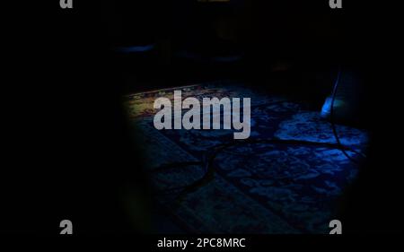 View on stage of night club in yellow and blue lights Stock Photo