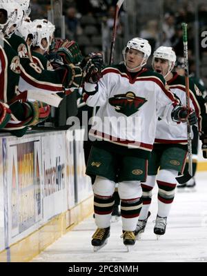 Petteri Nummelin of the Minnesota Wild plays the puck against the