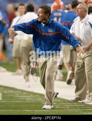 Florida coach Urban Meyer yells to his team during the second