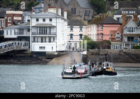 The Dart lower ferry at Dartmouth Devon Uk. The ferry has departed from Kingswear and crossed the river Dart to Dartmouth. Vehicles wait to disembark Stock Photo