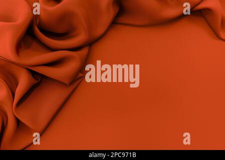 texture of crumpled fabric of red or orange color. Canvas. Textile. Material chintz or satin Stock Photo