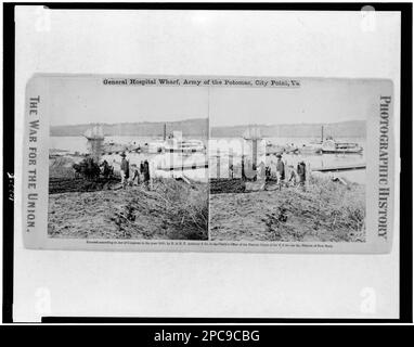 General hospital wharf. Army of the Potomac, City Point, Virginia. Civil War Photograph Collection . Men, Virginia, City Point, 1860-1870, Rivers, Virginia, City Point, 1860-1870, Piers & wharves, Virginia, City Point, 1860-1870, Government vessels, Union, Virginia, City Point, 1860-1870, United States, History, Civil War, 1861-1865, Transportation, Virginia, City Point, United States, History, Civil War, 1861-1865, Medical aspects, Virginia, City Point, Appomattox River (Va.), 1860-1870, Petersburg (Va.), History, Siege, 1864-1865. Stock Photo