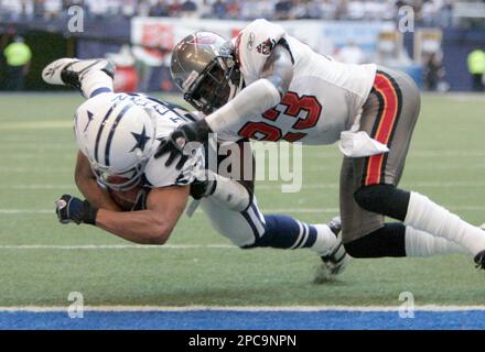 San Francisco, California, USA. 25th Sep, 2005. San Francisco 49ers  defensive back Tony Parrish (33) intercepts ball from Dallas Cowboys wide  receiver Terry Glenn (83) on Sunday, September 25, 2005, in San