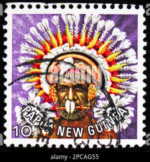 MOSCOW, RUSSIA - FEBRUARY 15, 2023: Postage stamp printed in Papua New Guinea shows Headdress from Koiari, serie, circa 1978 Stock Photo