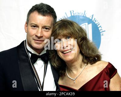 Timothy Egan and his wife Joni pictured during arrivals at the