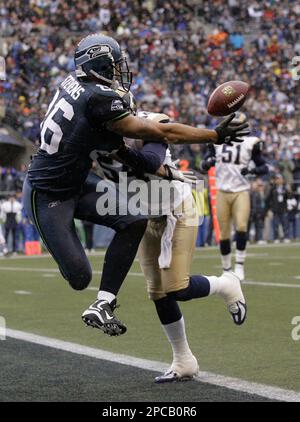 Atlanta Falcons tight end Dwayne Blakley (85) is pulled down by St. Louis  Rams Brandon Chillar after a reception in the second quarter at the Edward  Jones Dome in St. Louis on