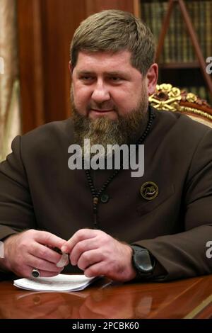 Moscow, Russia. 13th Mar, 2023. Chechen Republic leader Ramzan Kadyrov listens during a face-to-face meeting with Russian President Vladimir Putin at the Kremlin, March 13, 2023 in Moscow Oblast, Russia. Credit: Mikhail Klimentyev/Kremlin Pool/Alamy Live News Stock Photo