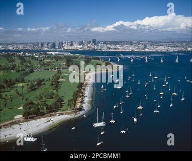 Long aerial view of San Diego, California, showing San Diego Bay and Glorietta Bay with Coronado Bridge Stock Photo