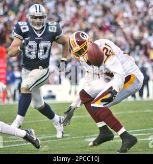 Washington Redskins Sean Taylor (21) and Rock Cartright (31) tie