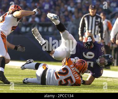 Tampa Bay Buccaneers fullback Mike Alstott bulldozes over Cincinnati  Bengals cornerback Keiwan Ratliff during game action. The Buccaneers  defeated the Bengals, 14-13, at Raymond James Stadium in Tampa, Florida,  Sunday, October 15