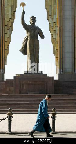 A Tajik man passes by the monument to Ismail Somoni, the founder of Tajik state, in Dushanbe, Tajikistan, Thursday, Nov. 2, 2006. Residents of the poor Central Asian, ex-Soviet republic go to the polls Monday for presidential elections that incumbent Emomali Rakhmonov is widely expected to win. (AP Photo/Sergei Grits)