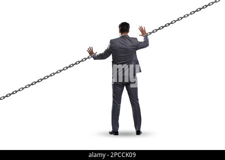 Chained businessman in the workaholic concept Stock Photo