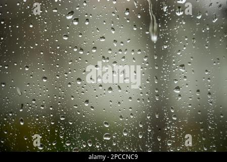 Rain drops on window glasses texture background Stock Photo