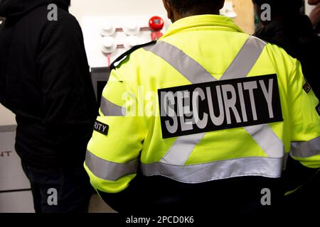 Security guards are learning how to use fire alarm panel Stock Photo