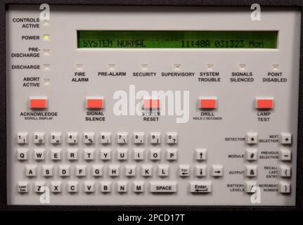 Security guards are learning how to use fire alarm panel Stock Photo
