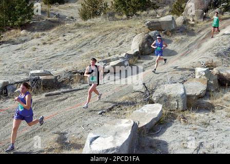 Helena s Marta Fisher left Billings Sarah Graves second left