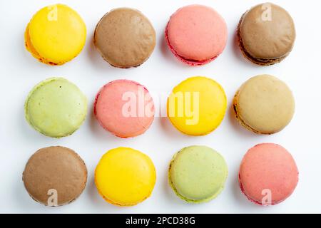 Multi-coloured Macarons on white background Stock Photo