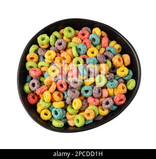 Colorful Breakfast Rings Pile in Bowl Isolated. Fruit Loops, Fruity Cereal Rings, Colorful Corn Cereals on White Background Top View Stock Photo
