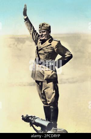 1940 ca. ,  Italy : The italian Fascist Duce BENITO MUSSOLINI  . The same photo displayed on the Mussolini tomb in san Cassiano di Predappio , Forlì  - ritratto - portrait - POLITICA - POLITICO -  ITALIA - POLITIC - portrait - ITALY - FASCISMO - FASCISM - FASCISTA - military uniform - divisa - uniforme militare -  saluto fascista - stivali - boots - WWII - SECONDA GUERRA MONDIALE - 2nd - COLOSSEO - ROME - ITALIA - guanti - gloves  ----  Archivio GBB Stock Photo