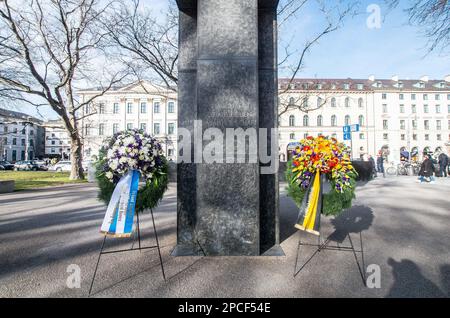 March 13, 2023, Munich, Bavaria, Germany: Assembling at the Platz der Opfer des Nationalsozialismus (Plaza for the Victims of National Socialism) in Munich, Germany, Director CAROLINE LINK, FC-Bayern President HERBERT HAINER, Munich Deputy Mayor KATRIN HABERSCHADEN of the Greens, and MEHMET DAIMAGÃœLER, Federal Commissioner Against Antiziganism assembled together to memorialize the 80th anniversary of the deportations of Sinti and Roma from Munich. Some research indicates the ultimate death toll of Roma to be between 1.5 and 2 million with many along the way having been funneled into human exp Stock Photo