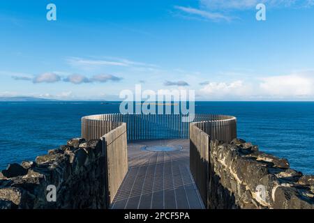 Viewing platform at the Magheracross Viewing Point above the sea and offshore islands along Northern Ireland's Causeway Coast Stock Photo