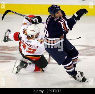 Carolina Hurricanes' Eric Staal, top, knocks Edmonton Oilers' Jarret Stoll  to the ice during Game 2 of the NHL Stanley Cup Finals at the RBC Center in  Raleigh, NC June 7, 2006. (