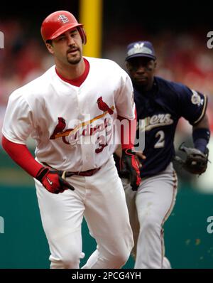 Milwaukee Brewers' J.J. Hardy slides home during the fourth inning of a  baseball game Thursday, May 14, 2009, in Milwaukee. (AP Photo/Morry Gash  Stock Photo - Alamy