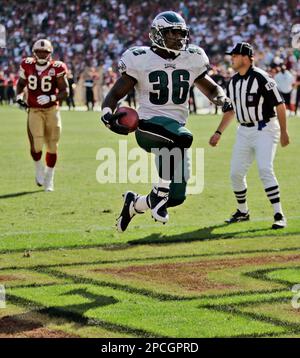 Philadelphia Eagles Brian Westbrook jumps over the pile and into the  endzone for a 1 yard touchdown late in the 2nd quarter at Giants Stadium in  East Rutherford, New Jersey on December