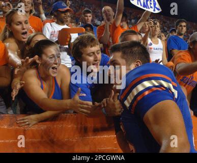 University of Florida freshman quarterback Tim Tebow scrambles against LSU  during the first half of football for the Gators in Gainesville, Florida on  October 7, 2006. (UPI Photo/Ralph Notaro Stock Photo - Alamy