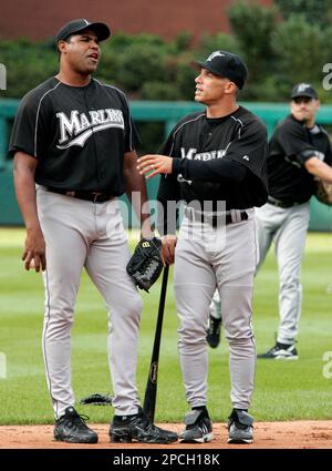 Florida Marlins manager Joe Girardi looks at the field during the team's  home opener baseball game against the San Diego Padres Tuesday, April 11,  2006, in Miami. The Pasres won 9-3. (AP