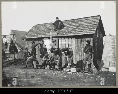 'Pine Cottage', Civil War soldiers winter quarters. Caption continues: '(US Army Signal corps 'Brady photographs' catalogue, 1921, no. B-256)', Title from item. United States, History, Civil War, 1861-1865. Stock Photo