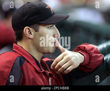 Houston Astros pitcher Andy Pettitte wipes his face with his jersey after  giving up a three-run homer to Los Angeles Dodgers' Nomar Garciaparra in  the third inning of a baseball game in