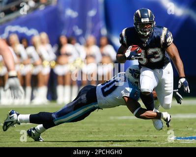 San Diego Chargers Michael Turner (33) fights to break free from