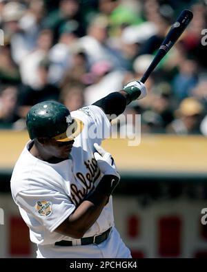 Oakland Athletics' Frank Thomas swings for a two-run home run off Chicago  White Sox' Javier Vazquez in the sixth inning of a baseball game Saturday,  Sept. 16, 2006, in Oakland Calif. Oakland